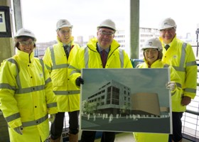 Group photo including First Minister at Innovation Centres launch