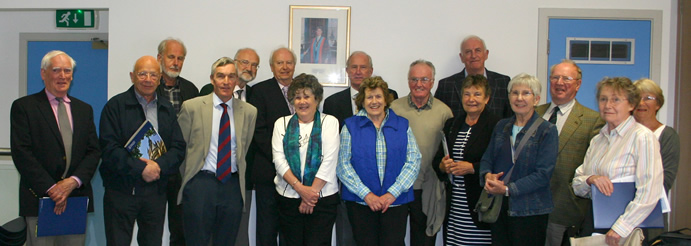 Group photo of class of 63 graduates on visit to alma mater