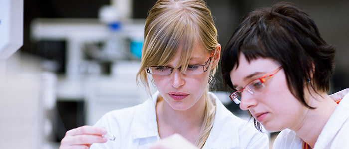 two students in a lab