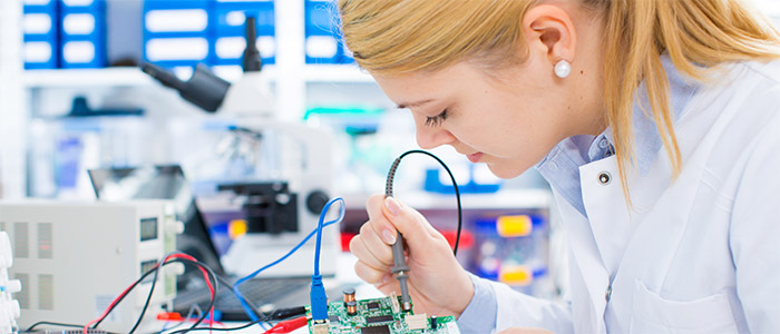 Female laboratory assistant Repairs PCB module