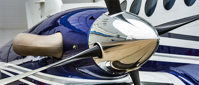 Closeup high detailed view of engine and airscrew of modern turboprop airplane
