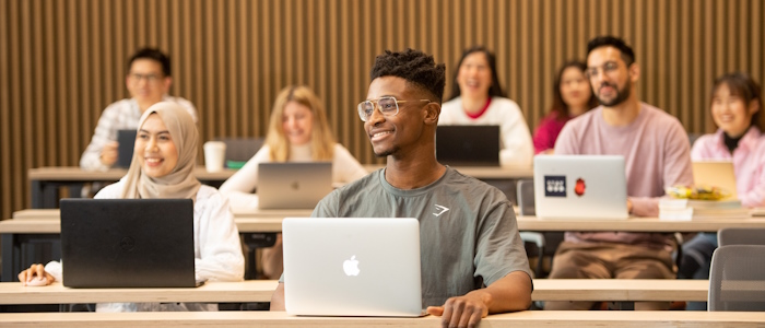 Students sitting in a lecture theatre