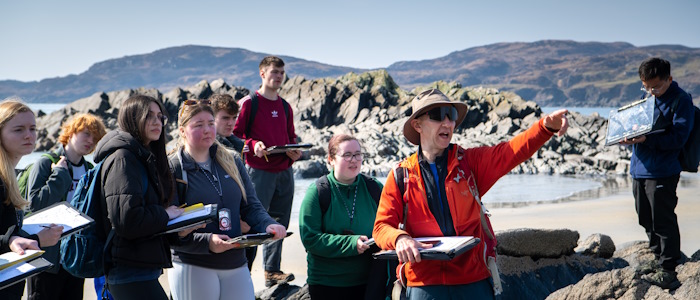 Fieldwork by Geographical & Earth Sciences on a beach