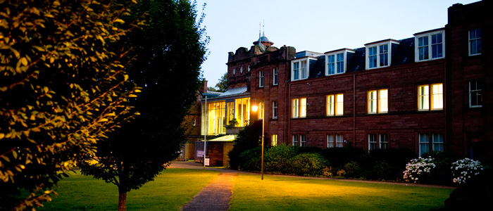 main building on Dumfries campus at dusk