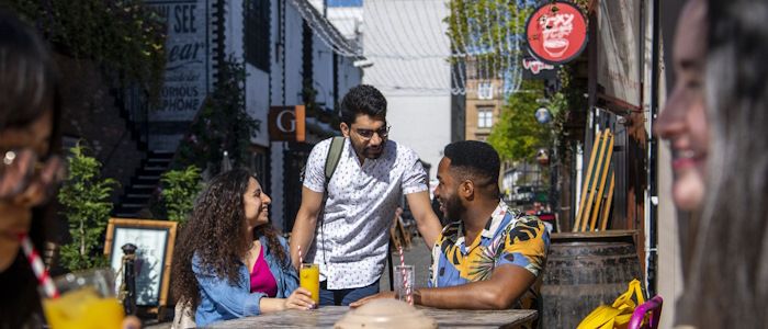A group of language students socialising on Ashton Lane