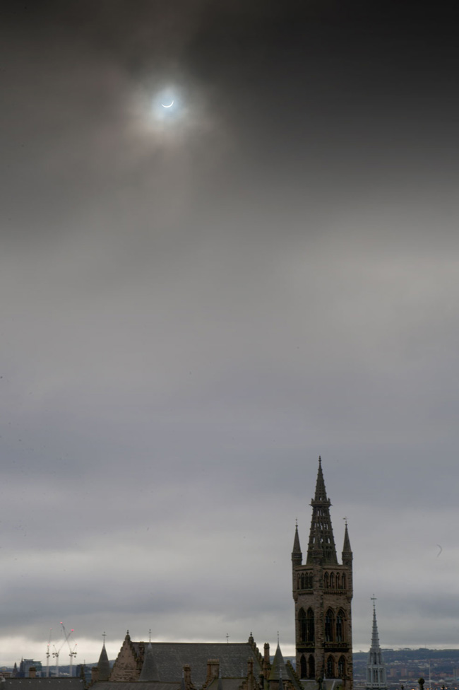 View of the solar eclipse with University in the foreground
