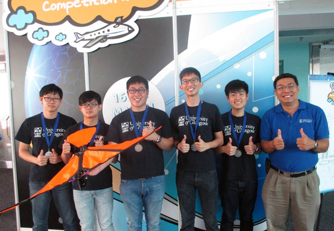 Successful Singapore Institute of Technology students with their flapping wing invention