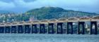 A view of Dundee railway bridge with the city of Dundee and Law Hill in the background