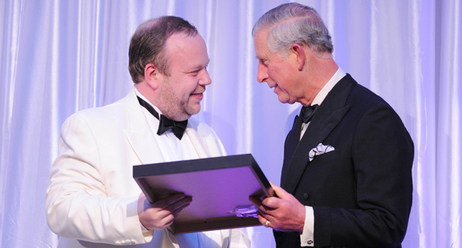 Image of Steve Johnson being presented with an award by HRH The Prince of Wales.