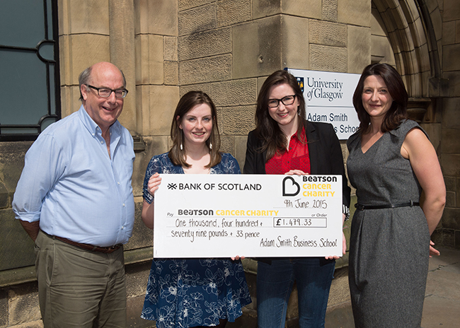 A cheque presentation from the Adam Smith Business School to The Beatson Cancer Charity. 