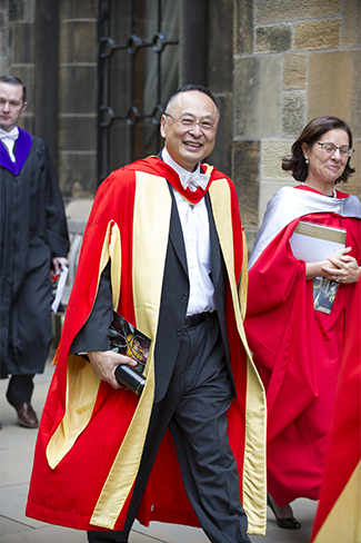 Dr Gerald Chan leaving graduation 