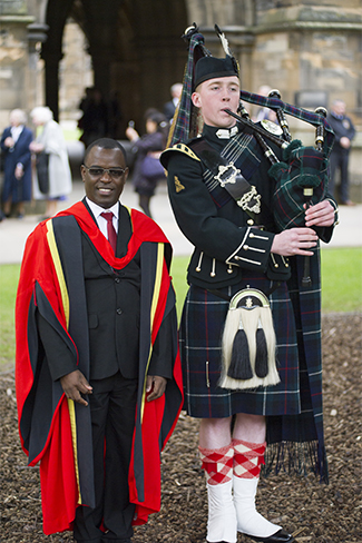 Dr Frank Mugisha with piper