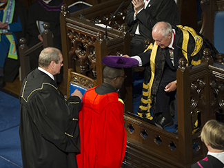 Dr Frank Mugisha - doffing the cap