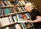 Image of a reader in the library