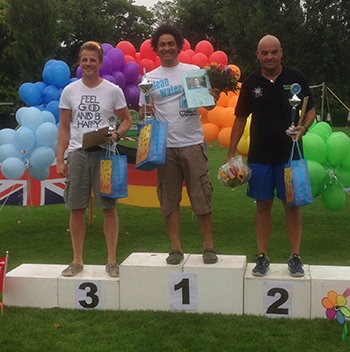 Jason Gill presented with first prize for swim across Lake Zurich