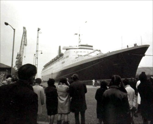 People gathered to see the new ship when it docks in Greenock.