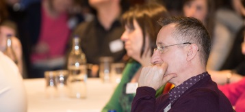 Danny & Judith listening to presentation
