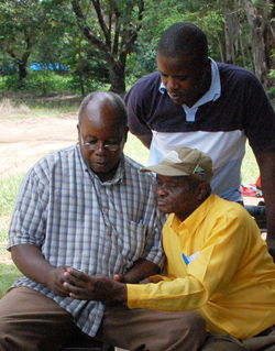Dr Chibonda (left) with veterinary workers. ©Katie Hampson
