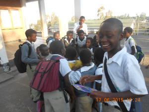 Kids reading comic in Malawi