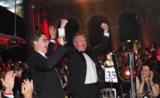 Image of Peter Aitchison and Daniel Marrable celebrating as the award was announced