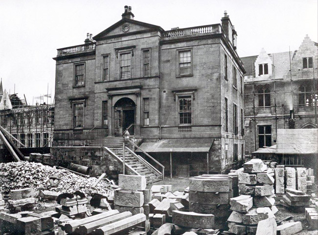 Image of Gilmore House in use as the site office during the construction of the University building.