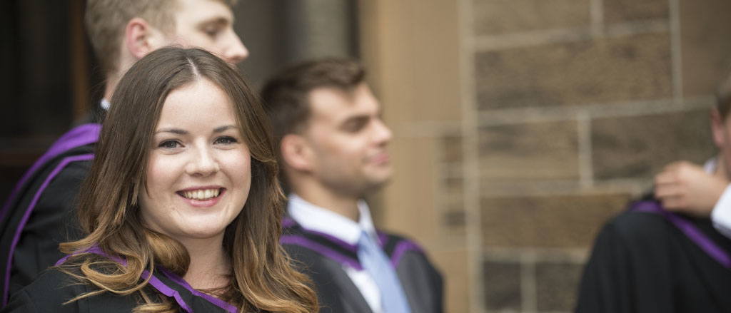 Smiling female graduate