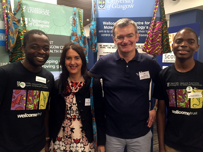 Beit /Glasgow funded masters students Nelson Simwela and Trancizeo Lipenga pictured with Margaret Ferrier MP and Prof Paul Garside.