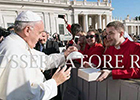 UofG student Paul Robertson offers Pope Francis a new skull cap, October 2016