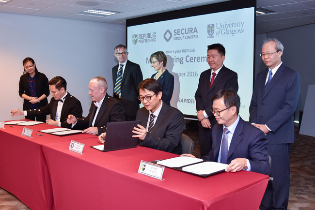 Image of the signing of the Singapore MoU in October 2016