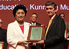 Professor James Conroy, Vice-Principal for Internationalisation, receiving Confucius Institute of the Year award from the Vice Premier of China, Mme Yandong Liu.