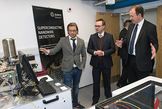 Jesse Norman MP being shown a superconducting nanowire detector at QuantIC