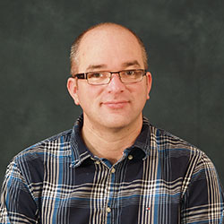Portrait photo of Dr Patrick Harkness