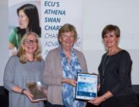 Asha Costigan and Audrey Dickie receiving Athena SWAN Silver