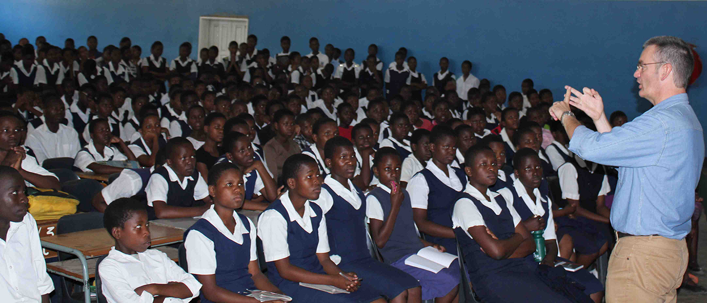 Professor Paul Garside talks to students at Blantyre Secondary School in Malawi