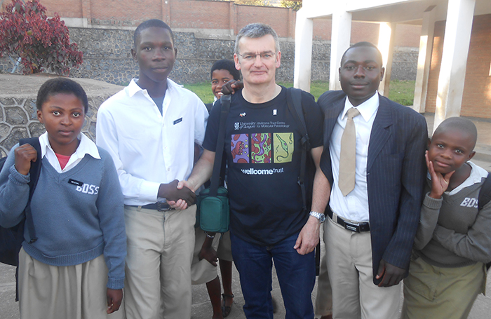 Professor Paul Garside with colleagues in Malawi