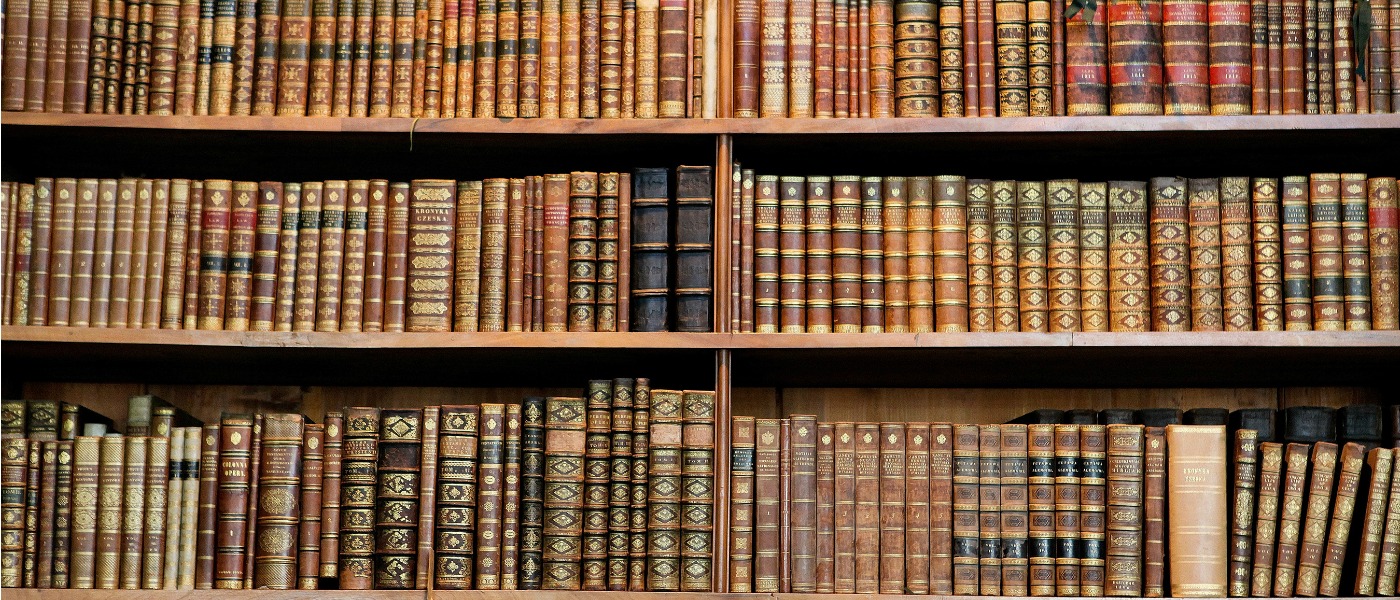 Image of old books in a library