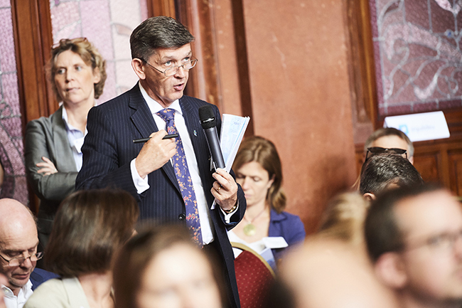 Image of Professor Jim Conroy addressing the Guild Forum