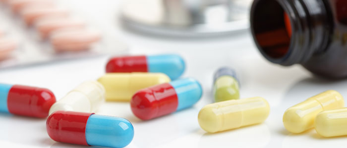 Image of medication tablets and capsules