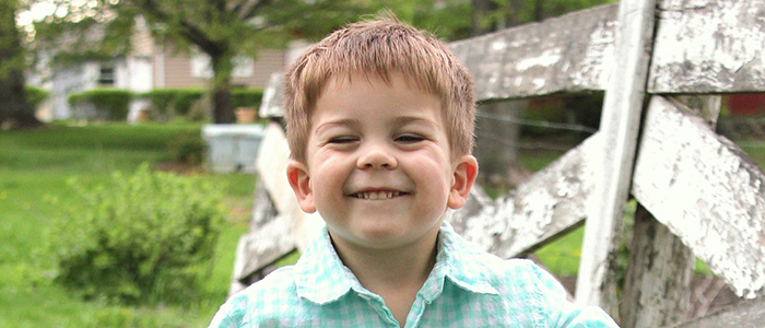 Image of a little boy smiling. Courtesy Pixabay - free images.