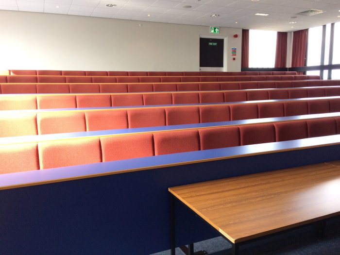 Raked lecture theatre with fixed seating