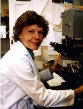 Professor Mackie with microscope 1948-2010