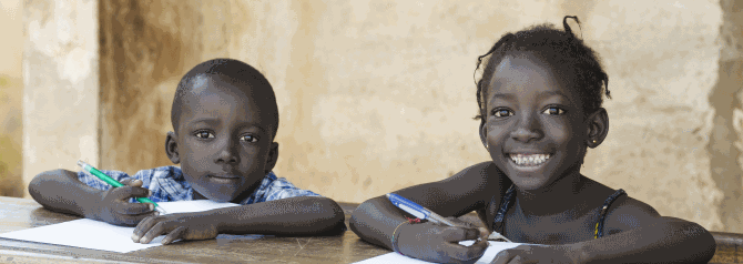 African school children with books