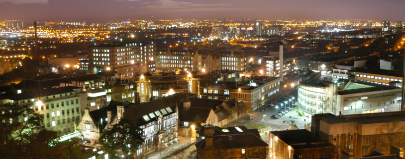 A nightime cityscape of Glasgow, UK