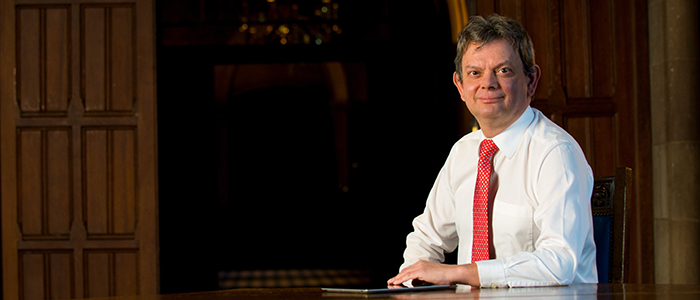 Image of the University Principal, Professor Sir Anton Muscatelli, seated.