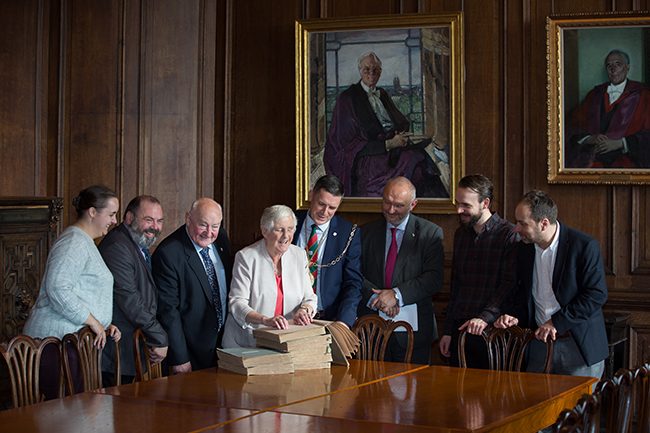 Image of the presentation of a rare Braille collection of the complete works of Robert Burns to the University of Glasgow