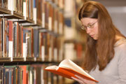 student in library