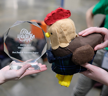 Image of the iGEM award and mascot