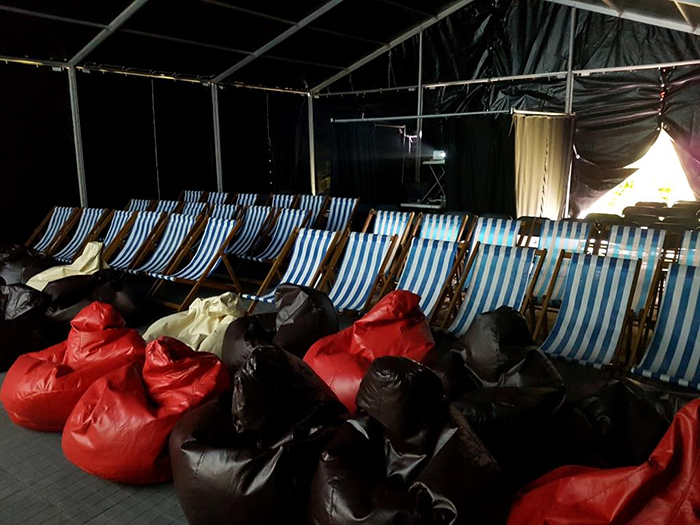 deckchairs and beanbags inside the indoor cinema where we showed Harry Potter and the prisoner of Azkaban