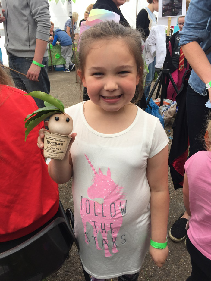 A girl shows off her Mandrake