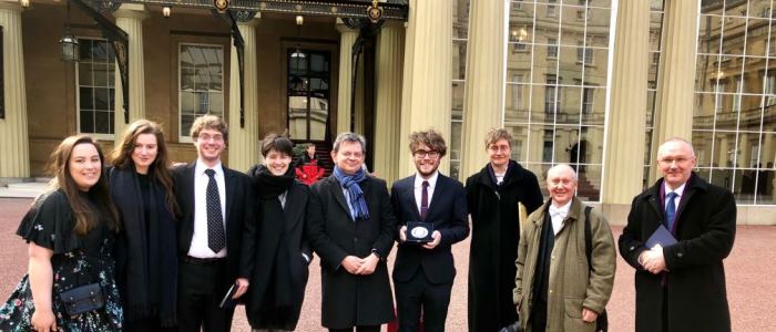 Queen's Anniversary Prize Full Team outside of Buckingham Palace after receiving their prize for the Historical Thesaurus of English